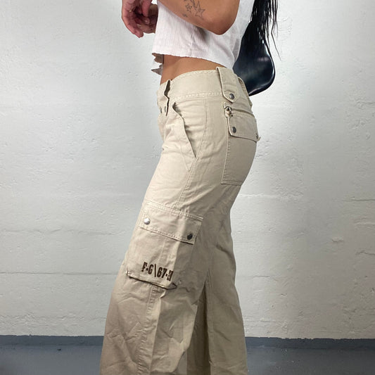 Vintage 2000’s Hip Hop Beige Wide Leg Low Waisted Side Pockets Pants with Metal Details (S)