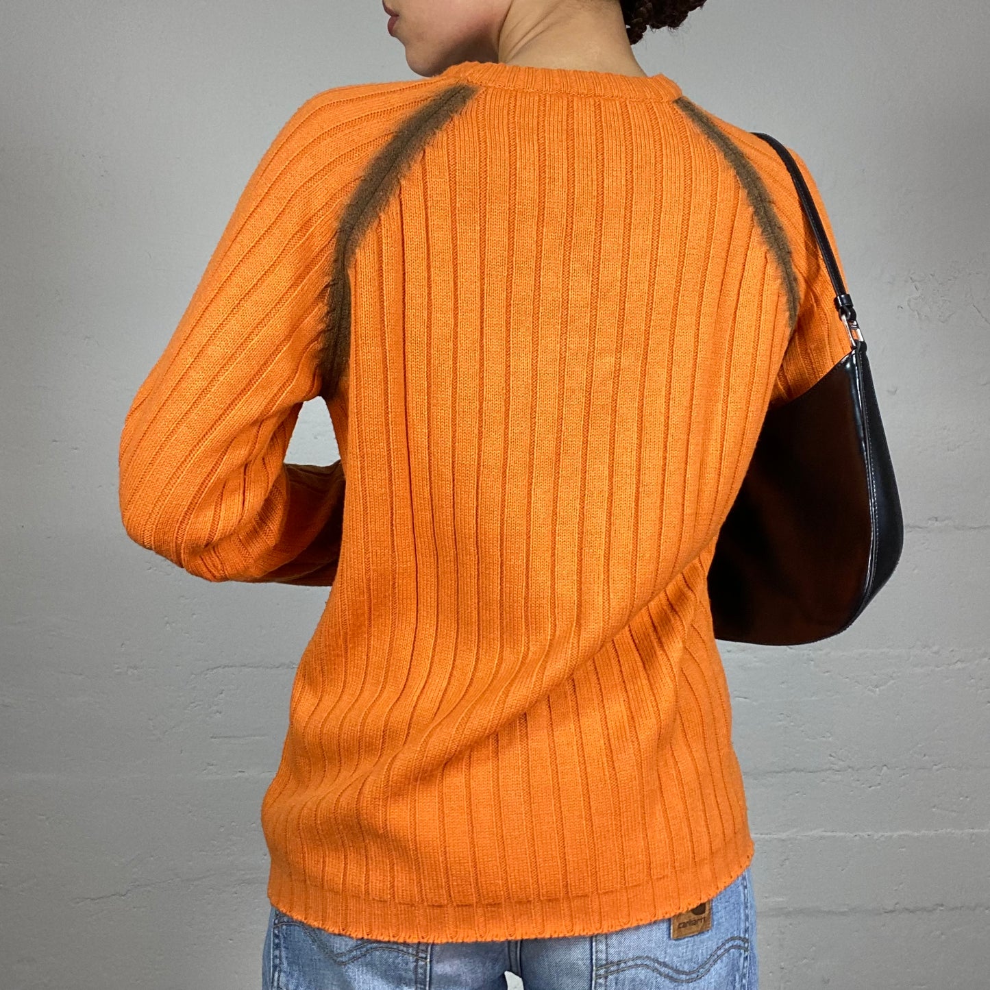 Vintage 90's Rave Orange Ribbed Knit Pullover with Sprayed Tribal Print Detail (M)
