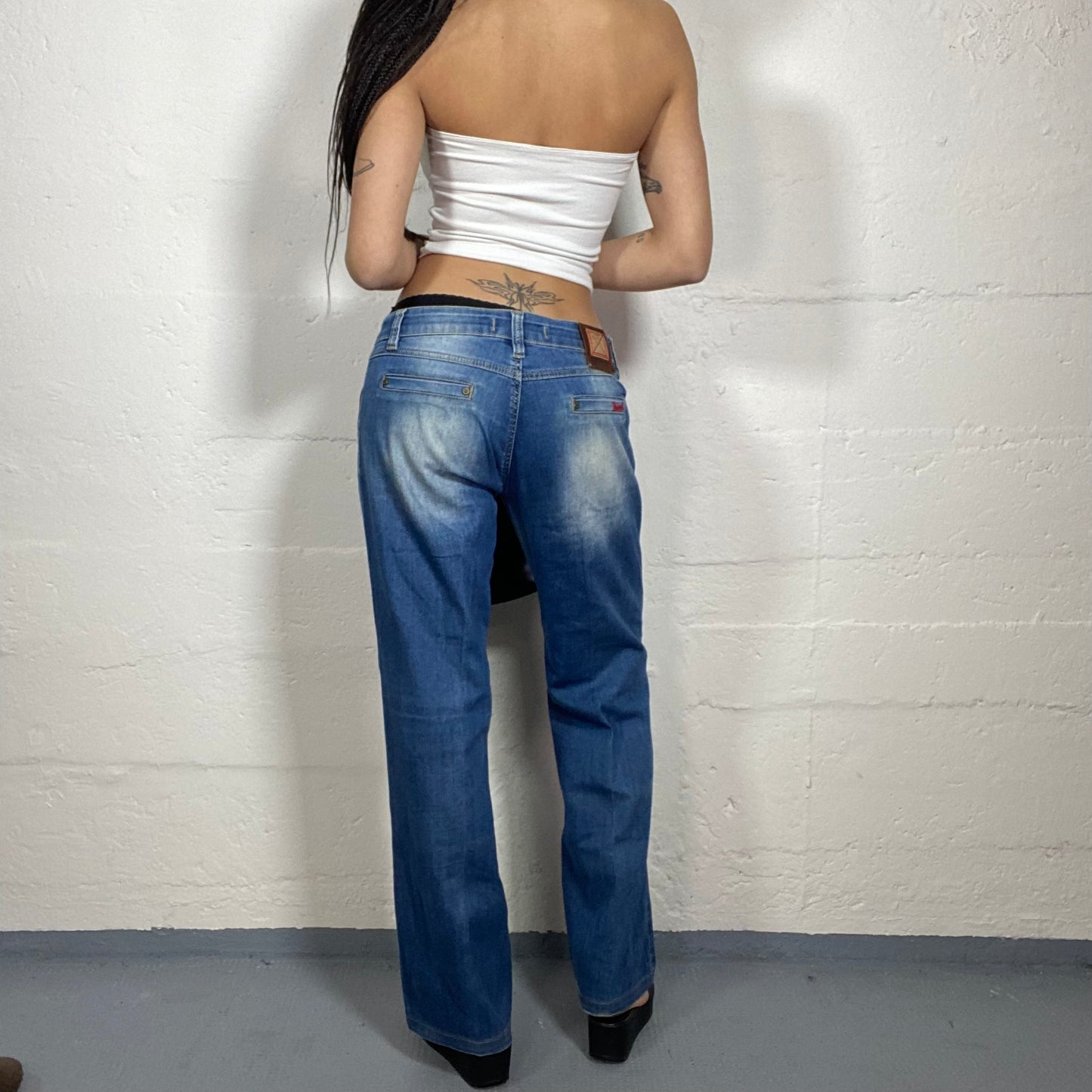 Vintage 2000's Diesel Sleaze Denim Low Waist Pants with Straight Cut and Bleached Material Detail (S)