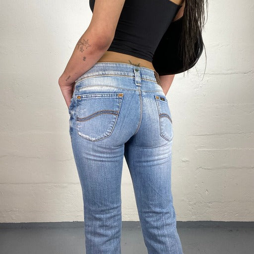 Vintage 90's Streetwear Light Washed Bootcut Low Waisted Jeans (S)