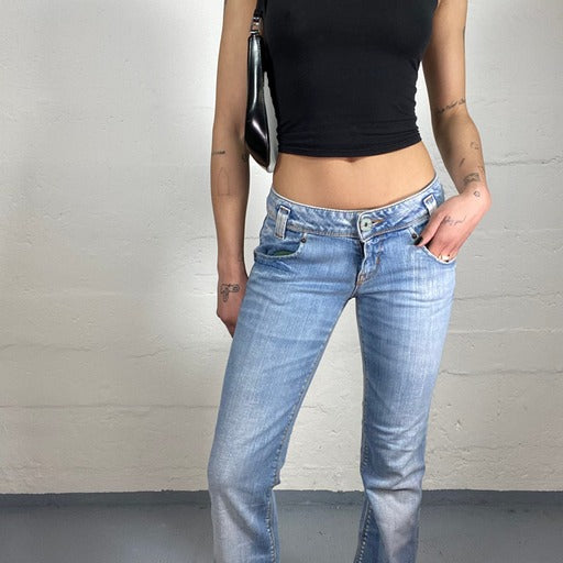 Vintage 90's Streetwear Light Washed Bootcut Low Waisted Jeans (S)