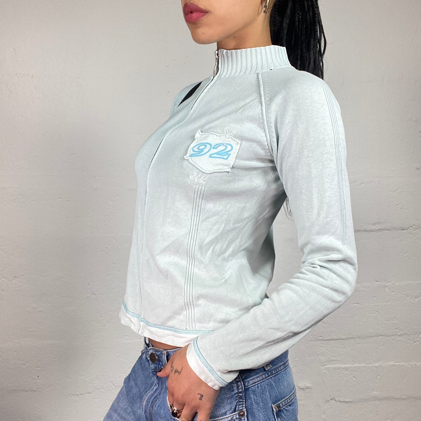 Vintage 2000's Sporty Baby Blue Knitted Zip Up Pullover with 92 Patch Embroidery (M)