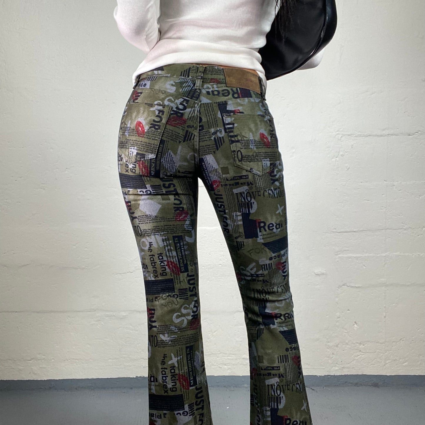 Vintage 2000's Downtown Girl Khaki Green Newspaper Style Print Middle Waist Bootcut Pants (S)