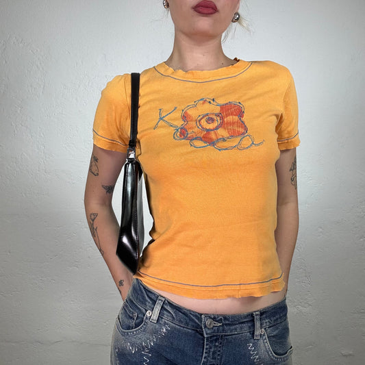 Vintage 2000's Skater Girl Orange Shirt with Contrast Stiching and Flower and ‚Kocca‘ Embroidery (S)g
