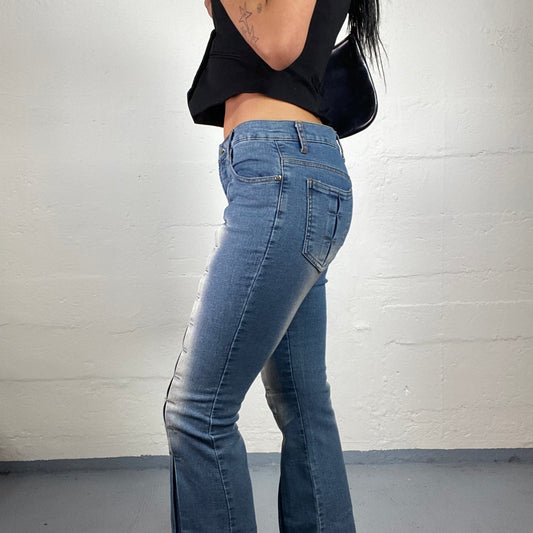 Vintage 2000's Cowgirl Classic Blue Mid Waist Flaired Jeans with Decoratively Stitched Cuts (S)