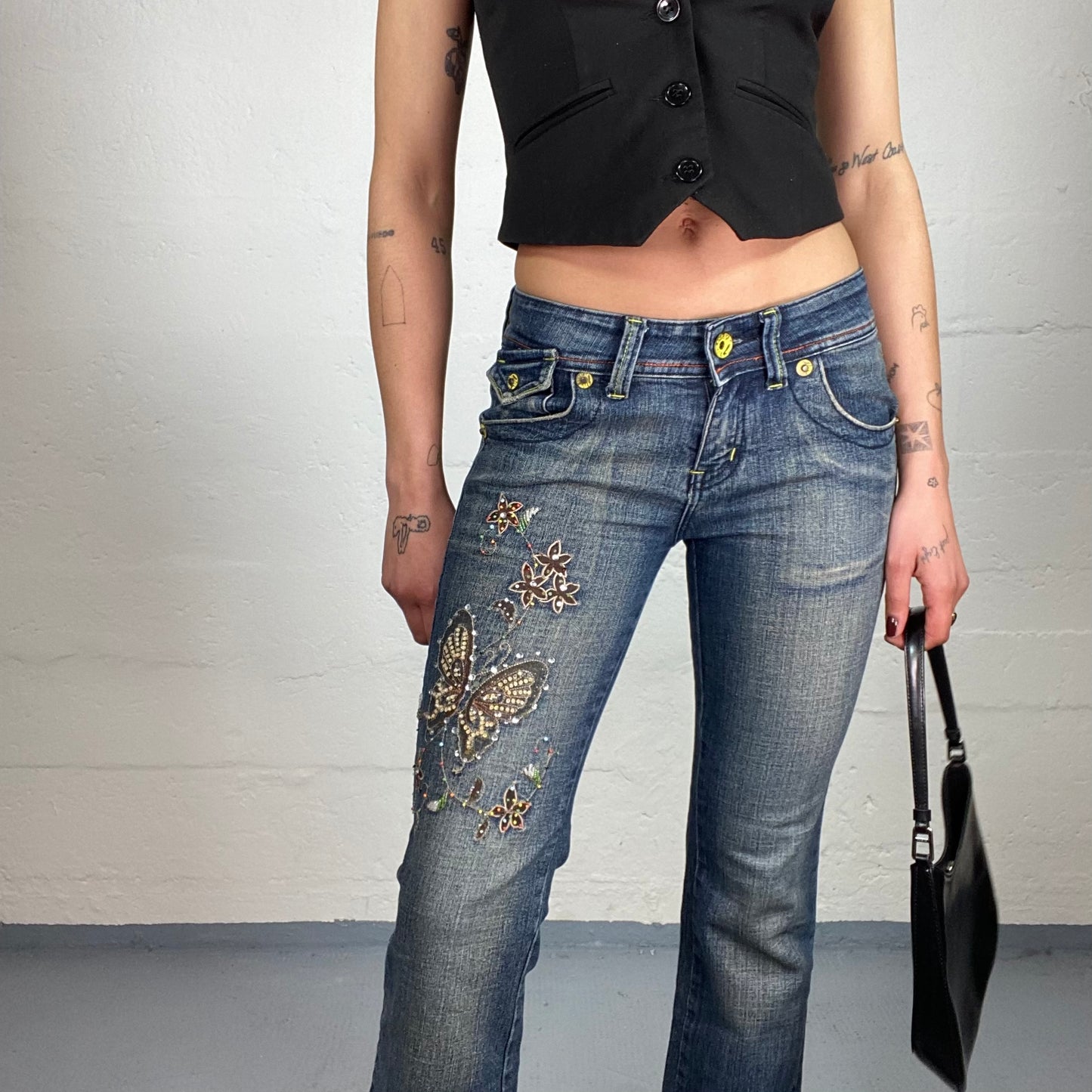 Vintage 2000’s Soft Girl Low Waisted Washed Out Slim Fitted Lightly Flared Jeans with Sewn On Embroidery Detail (S)