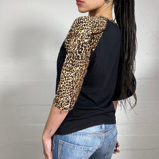 Vintage 2000’s Grunge Femme Fatale Typography and Cheetah Print 3/4 Sleeved Top (L)