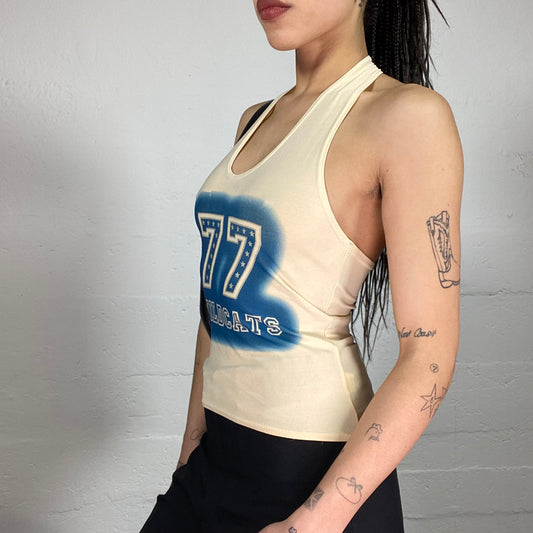 Vintage 2000’ Sporty Beige Summer Top with Blue „77 Wildcats“ Print (S/M)