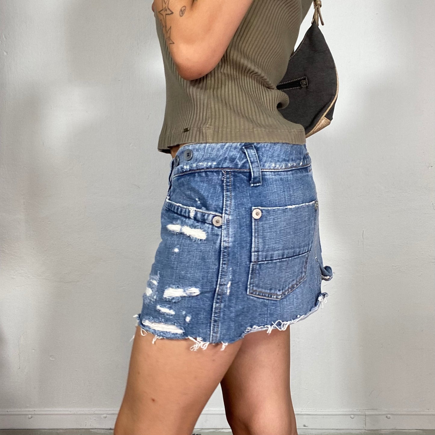 Vintage 2000's Downtown Girl Denim Ripped Mini Skirt with Leather Strap Detail (S)