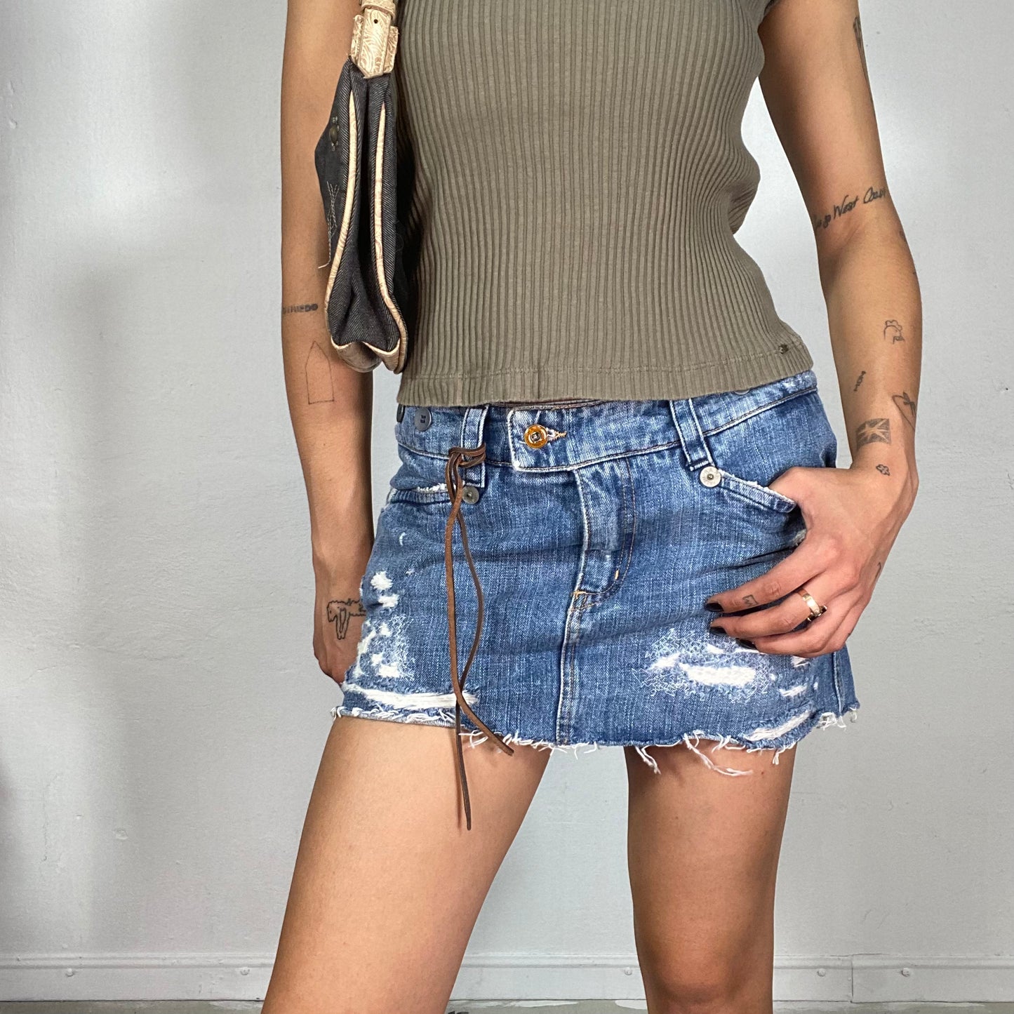 Vintage 2000's Downtown Girl Denim Ripped Mini Skirt with Leather Strap Detail (S)