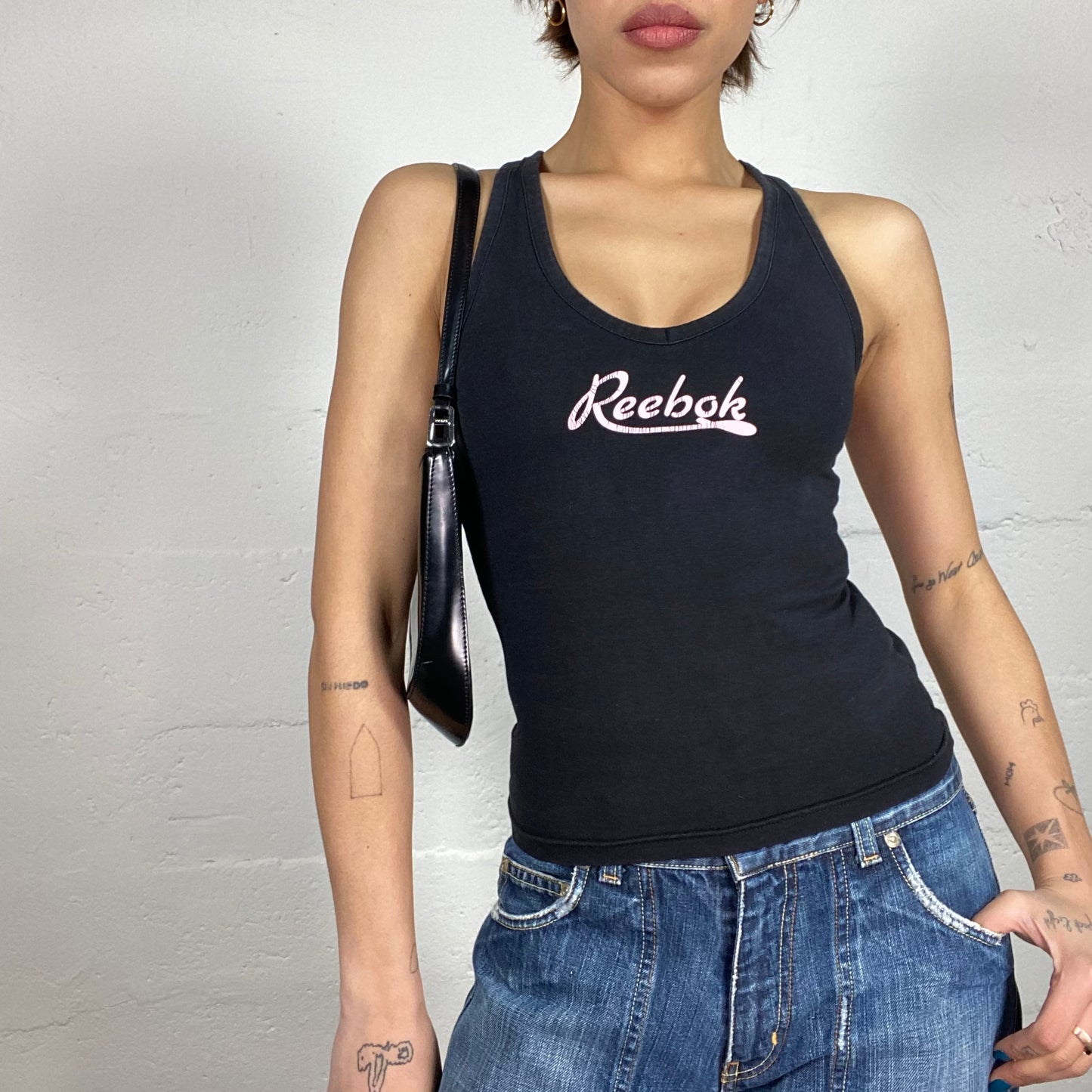 Vintage 90's Reebok Sporty Black Top with Cursive Brand Name Print Detail (S)