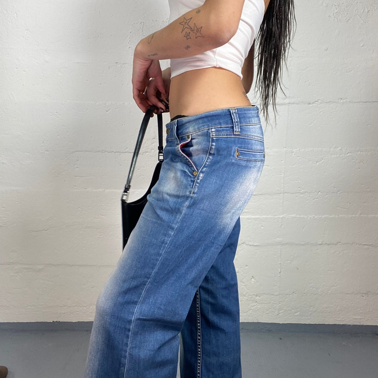 Vintage 2000's Diesel Sleaze Denim Low Waist Pants with Straight Cut and Bleached Material Detail (S)