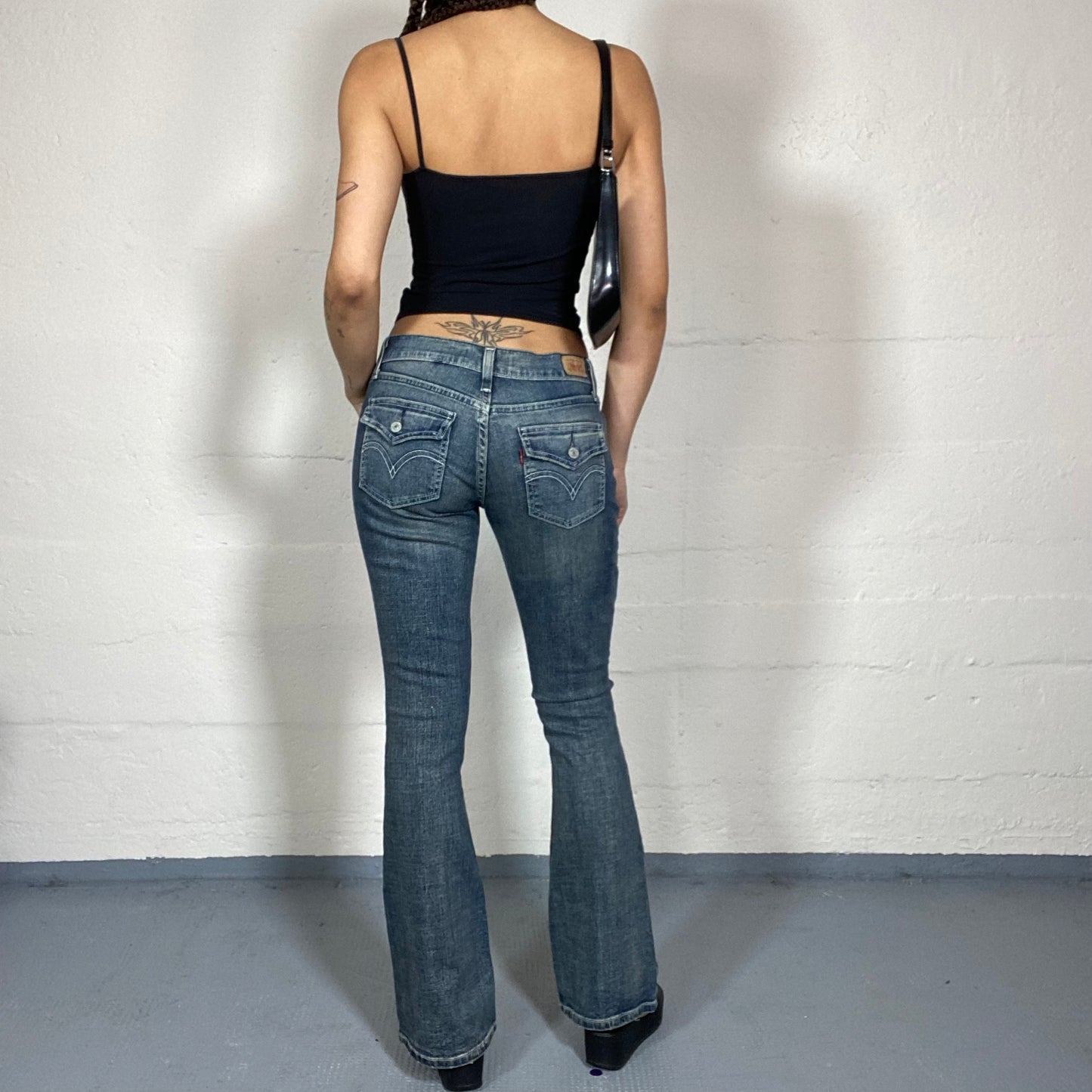 Vintage 90's Levi's Downtown Girl Washed Out Denim Jeans with Flared Cut Detail (S)