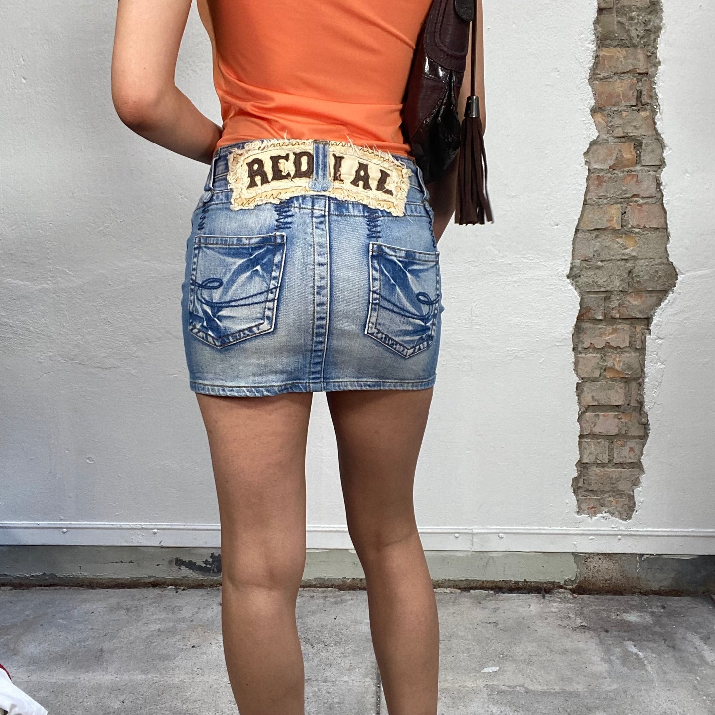 Vintage 90's Grunge Light Wash Denim Mini Skirt with 'Redial' Back Detail (S)