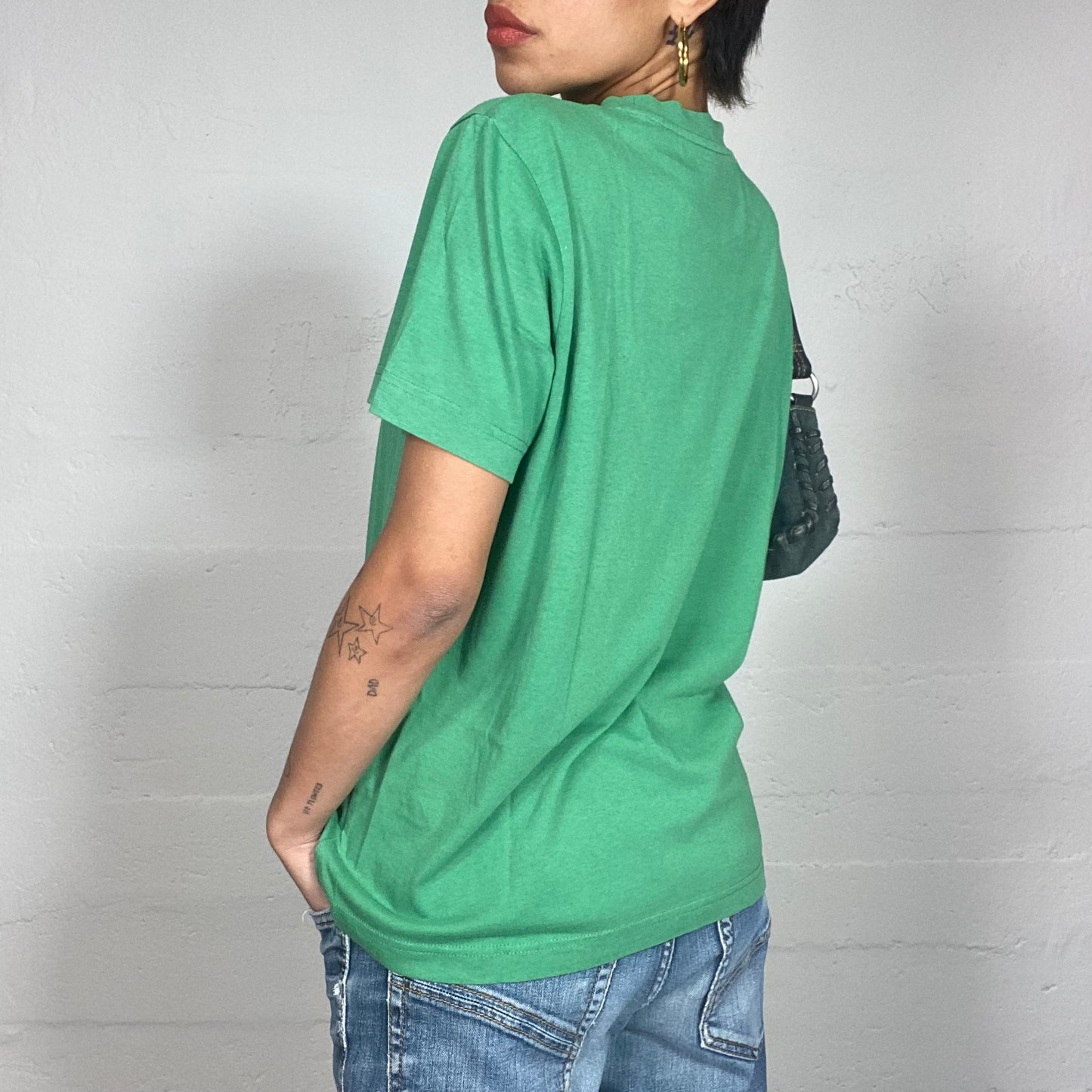 Vintage 90's Lotto Sporty Green Oversized Tee with Brand Print (L)