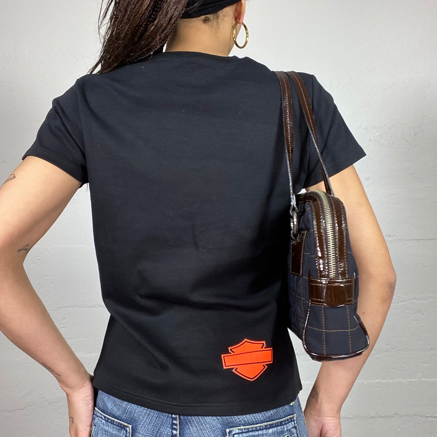 Vintage 2000's Harley Davidson Sleaze Black Oversized Tee with Orange Print (M/L)