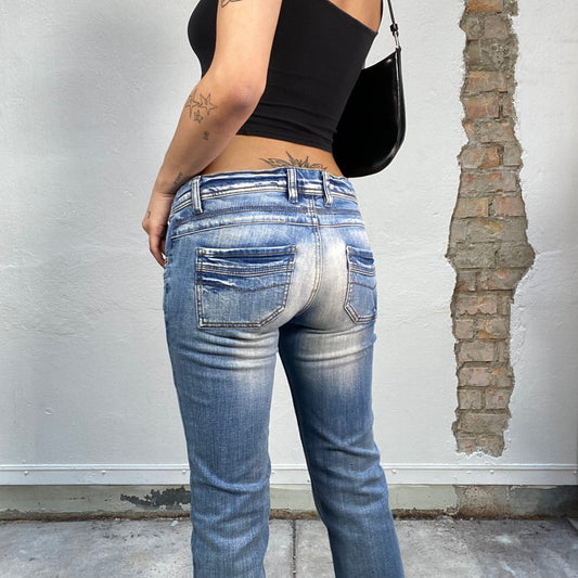 Vintage 2000's Model Off Duty Flared Mid Wash Jeans (S)