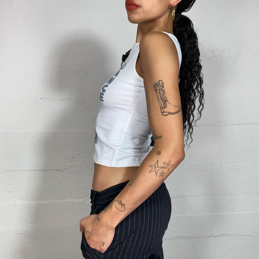 Vintage 2000's Downtown Girl Baby Blue Top with Denim Model Girl and "Dance" Glitter Print (S)