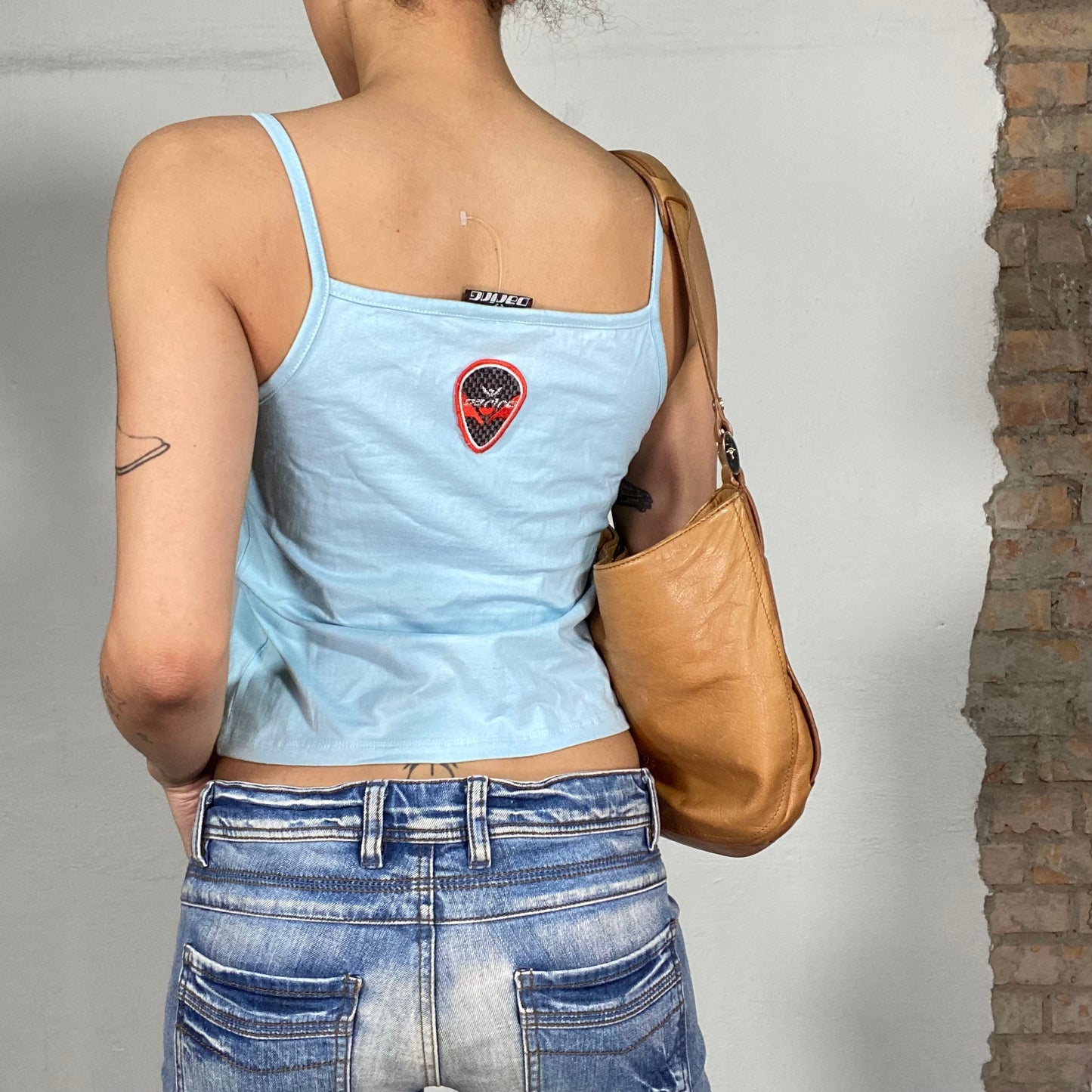 Vintage 90's Streetstyle Light Blue Top with Silver 'Darino' Print (S/M)