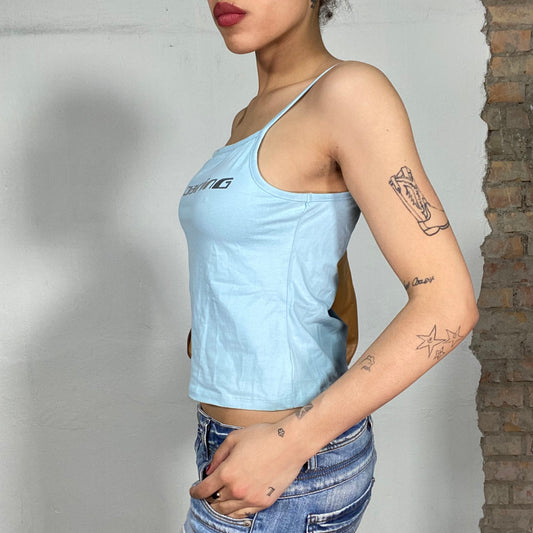 Vintage 90's Streetstyle Light Blue Top with Silver 'Darino' Print (S/M)