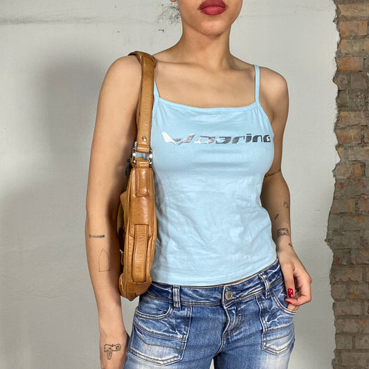 Vintage 90's Streetstyle Light Blue Top with Silver 'Darino' Print (S/M)