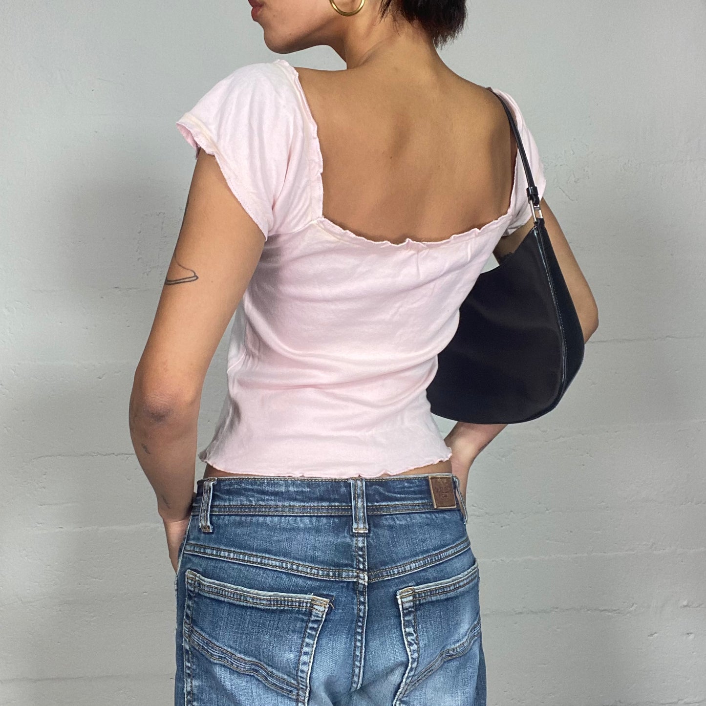 Vintage 2000's Totally Spies Baby Pink Off Shoulder Top with White "High School 15 Cheerleader" Print (M)