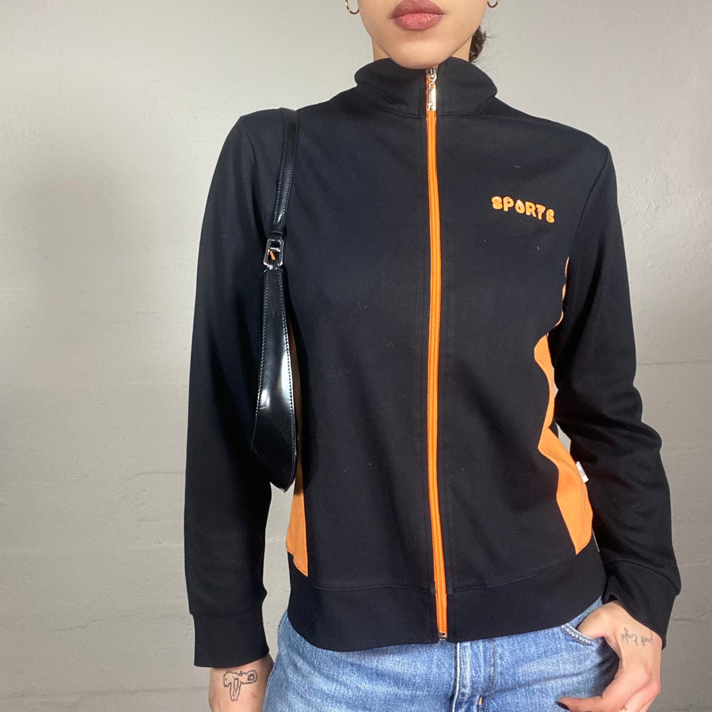 Vintage 90's Sporty Girl Black Zip Up Hoodie with Orange "Sports" Print (M)