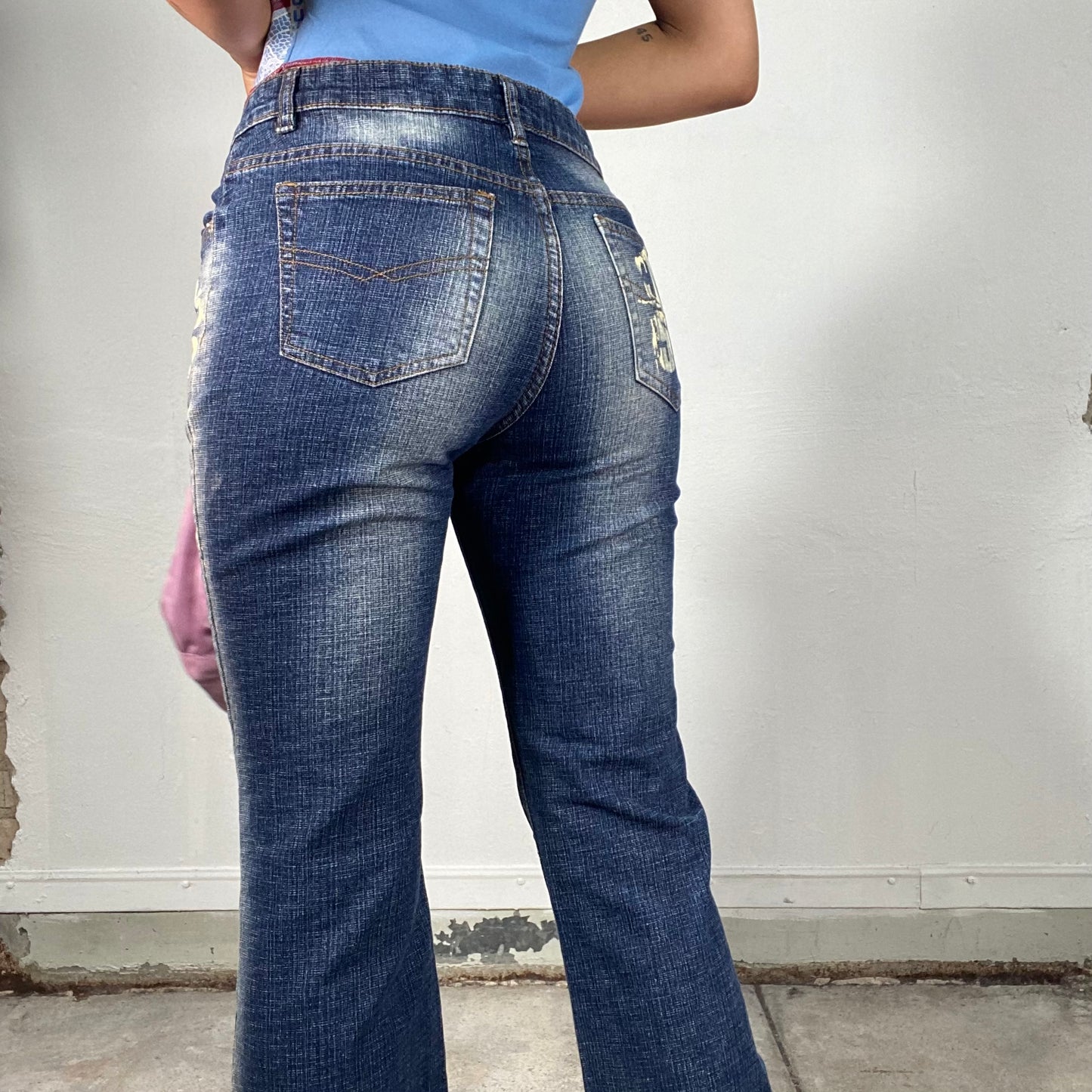 Vintage 2000's Street Style Dark Wash Flared Jeans with White Writing Print (S)