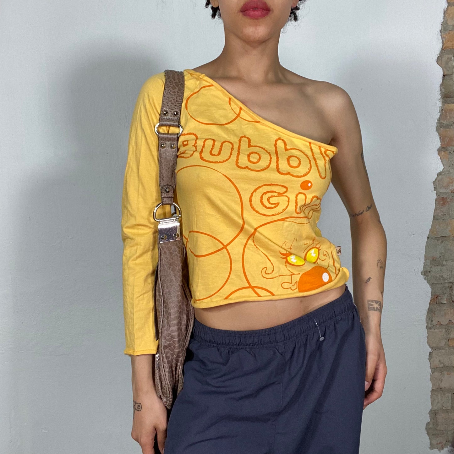 Vintage 90's Streetstyle Yellow One Shoulder Top with 'Bubbly Girl' Print (S/M)