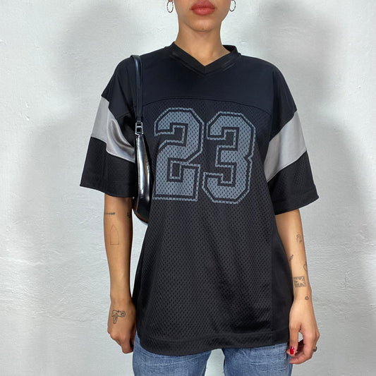 Vintage 90's Football Core Black Oversized Jersey with '23' Print (L)