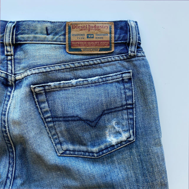 Vintage 90's Diesel Low Waist Baggy Jeans with Ripped Knee (34 EU / UK 6)