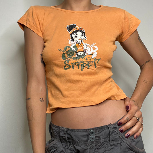 Vintage 90's Skater Orange Baby Tee with Surfer Girl Print (XS/S)