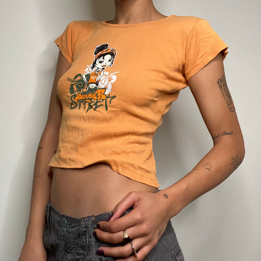 Vintage 90's Skater Orange Baby Tee with Surfer Girl Print (XS/S)