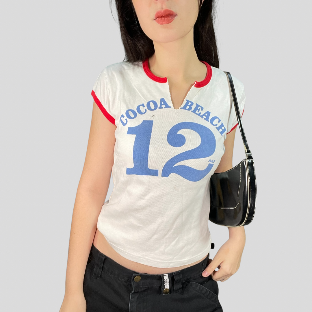 Vintage 90's Sporty White Shirt with Red Hem and Blue '12' Print (M/L)