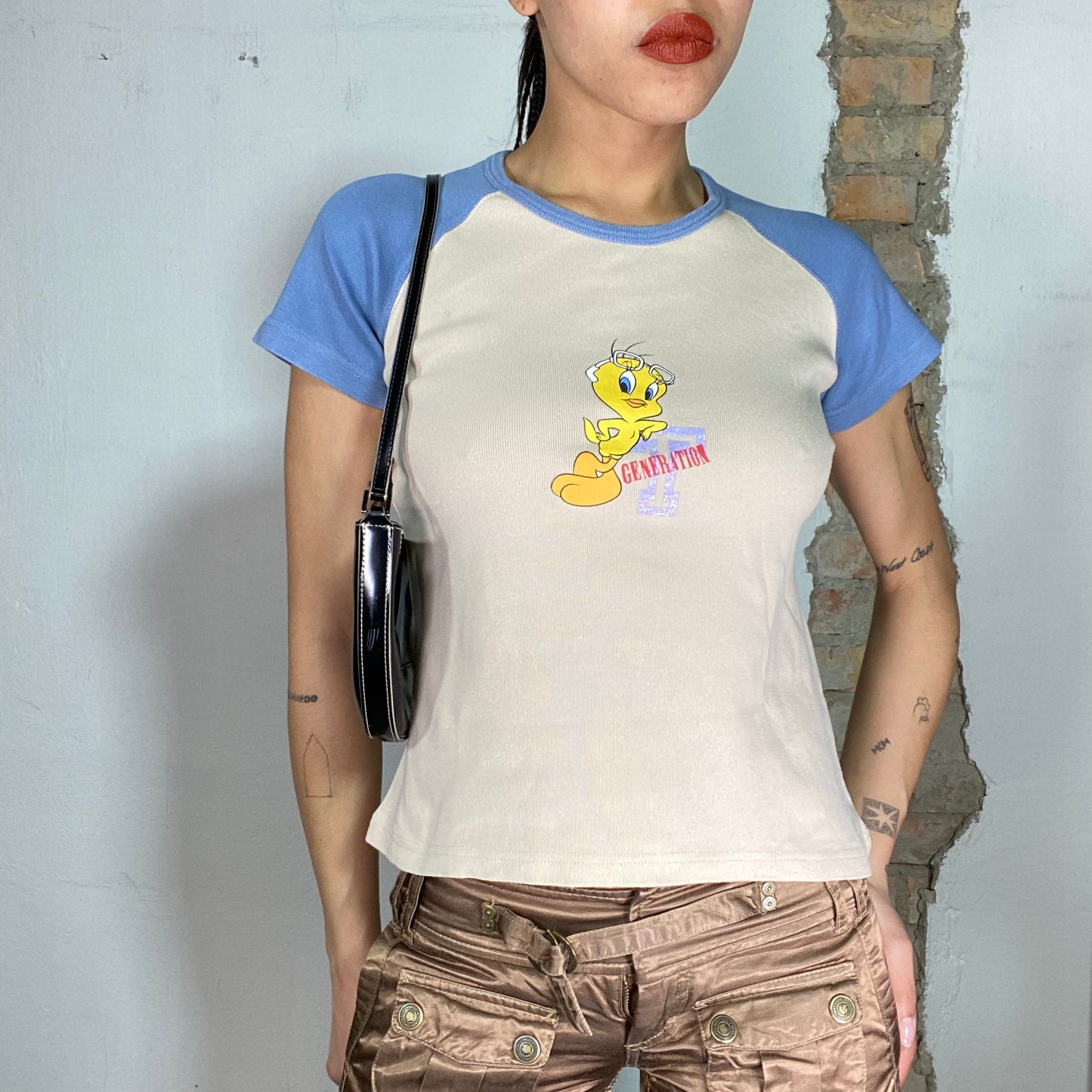 Vintage 2000's Sporty White and Blue Raglan Shirt with Tweety Print (S)