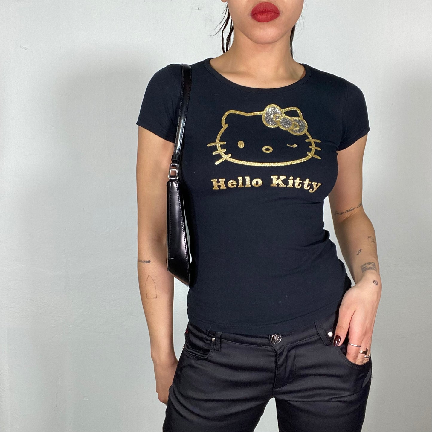 Vintage 2000's Hello Kitty Black Baby Tee with Gold Logo Print (XS/S)